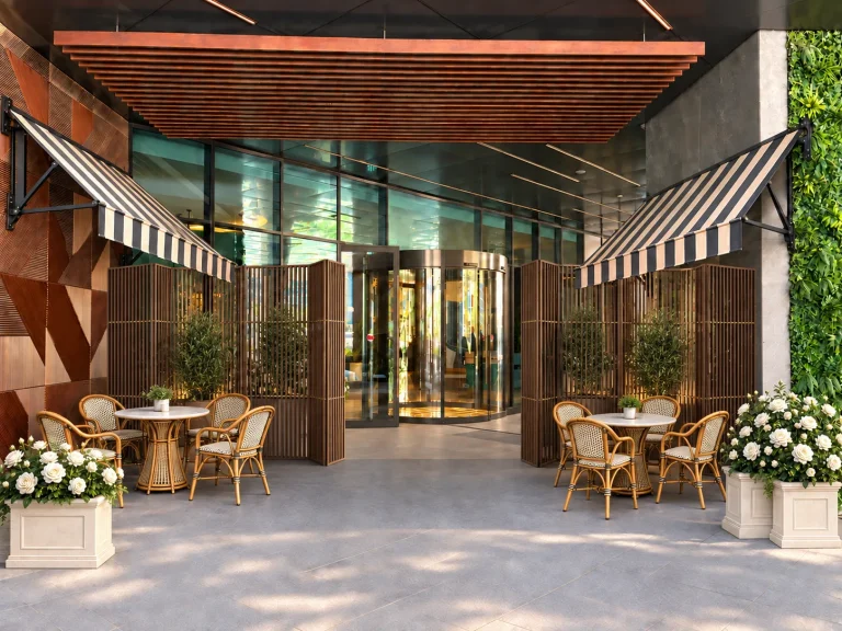 Cafe terrace under striped awnings, planting along the glazed frontage