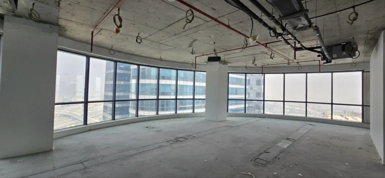 The shell before work, looking along the glazing towards the core