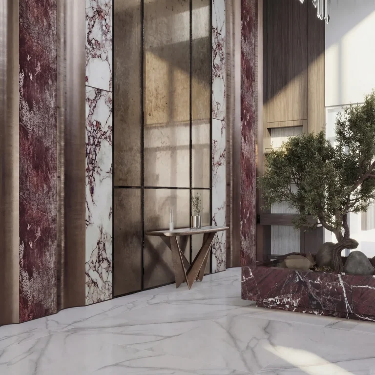 Entrance detail: book-matched marble columns and a bronze console
