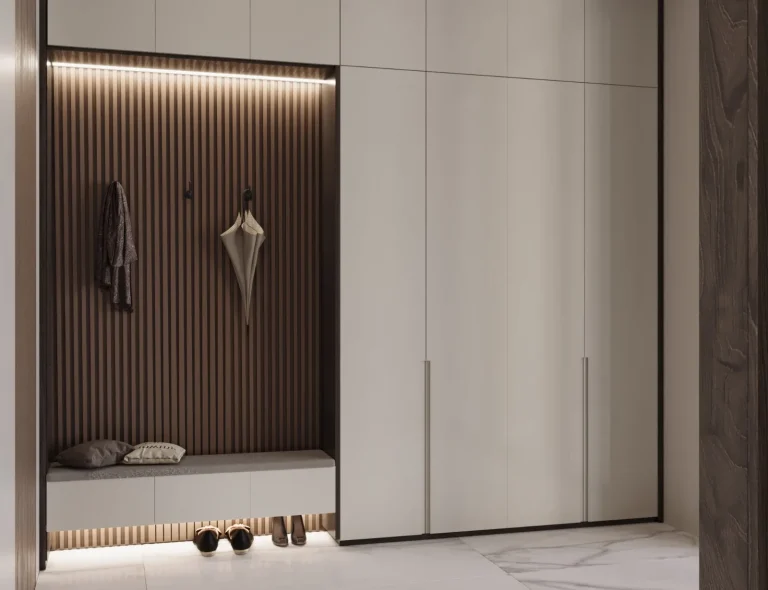 Entrance closet in fluted timber with a concealed bench